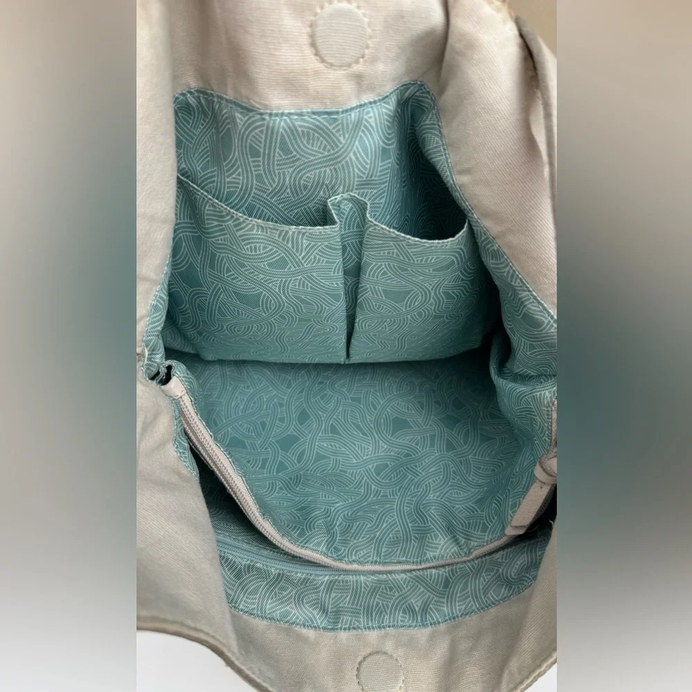 The Sak Huntley Hobo Bag. Ecru.Soft, Pebbled Leather w/Fabric Turquoise Interior - Picture 12 of 16